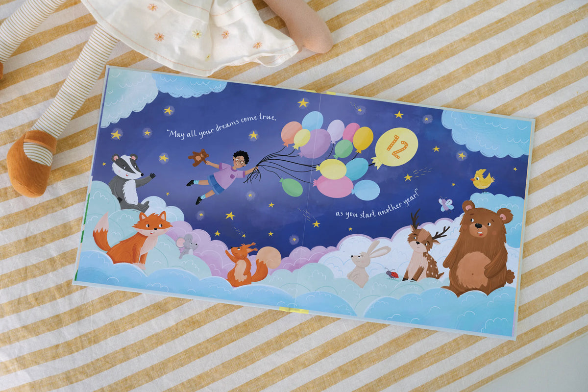 Inside page of Birthday Surprise showing a personalised birthday party illustration with the child as the star