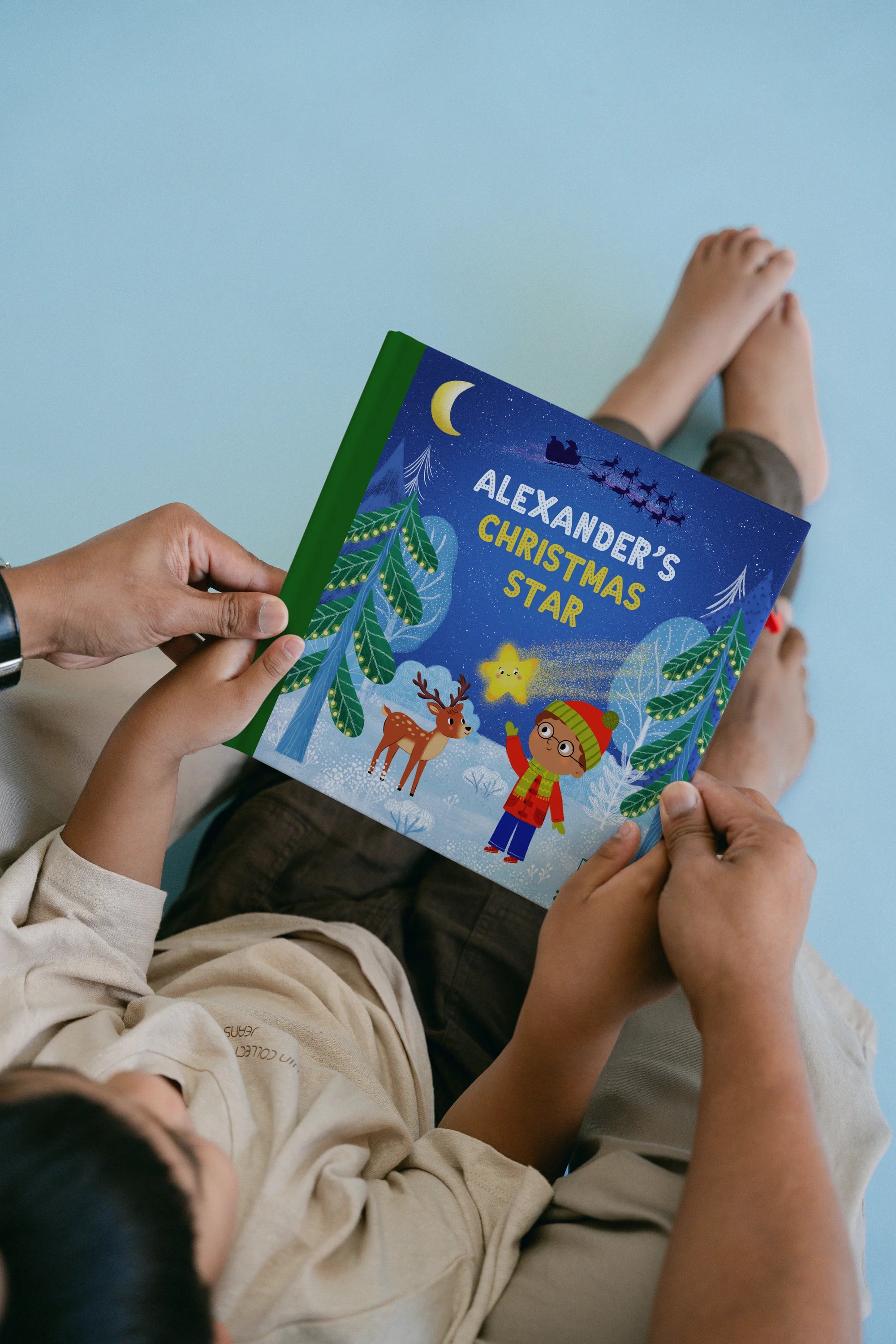 Open Ziggli Christmas Star book featuring festive holiday illustrations and decorative star cover design.