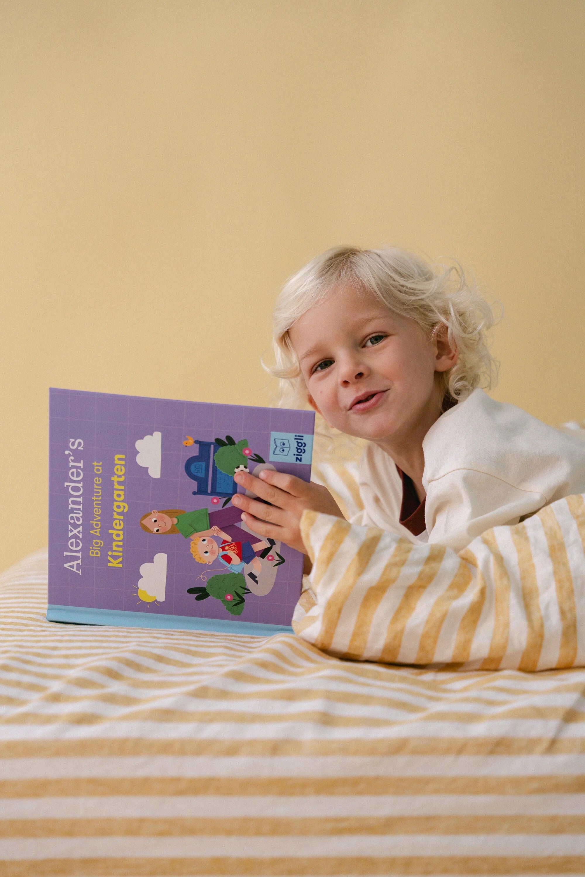Open pages of the personalised Big Adventure book by Ziggli showing illustrated scenes of children exploring and learning