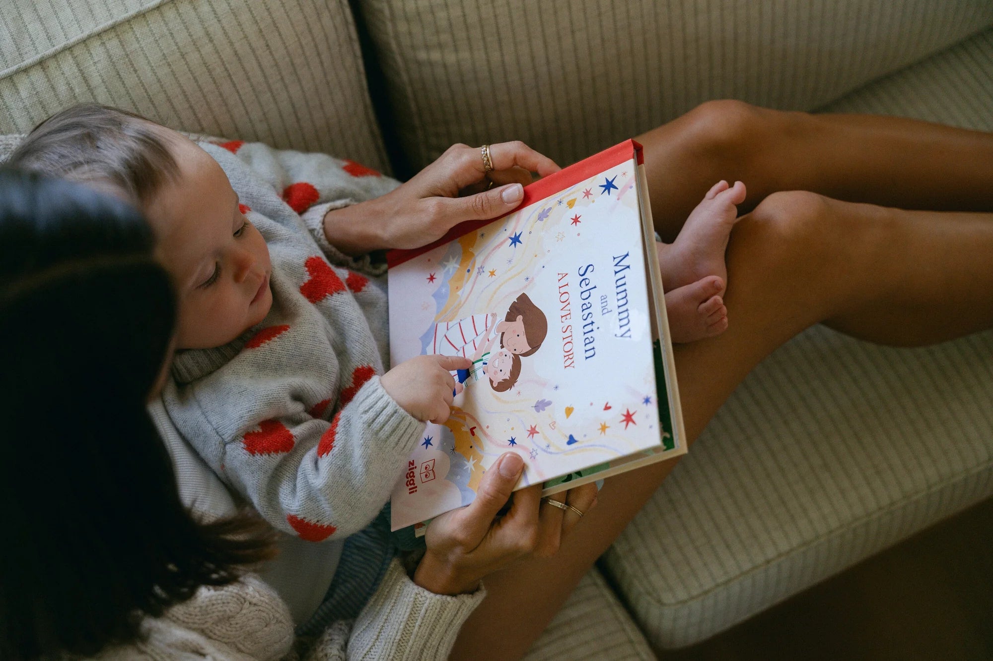 Open pages of the personalised A Love Story book by Ziggli with colourful illustrations about a mother's love