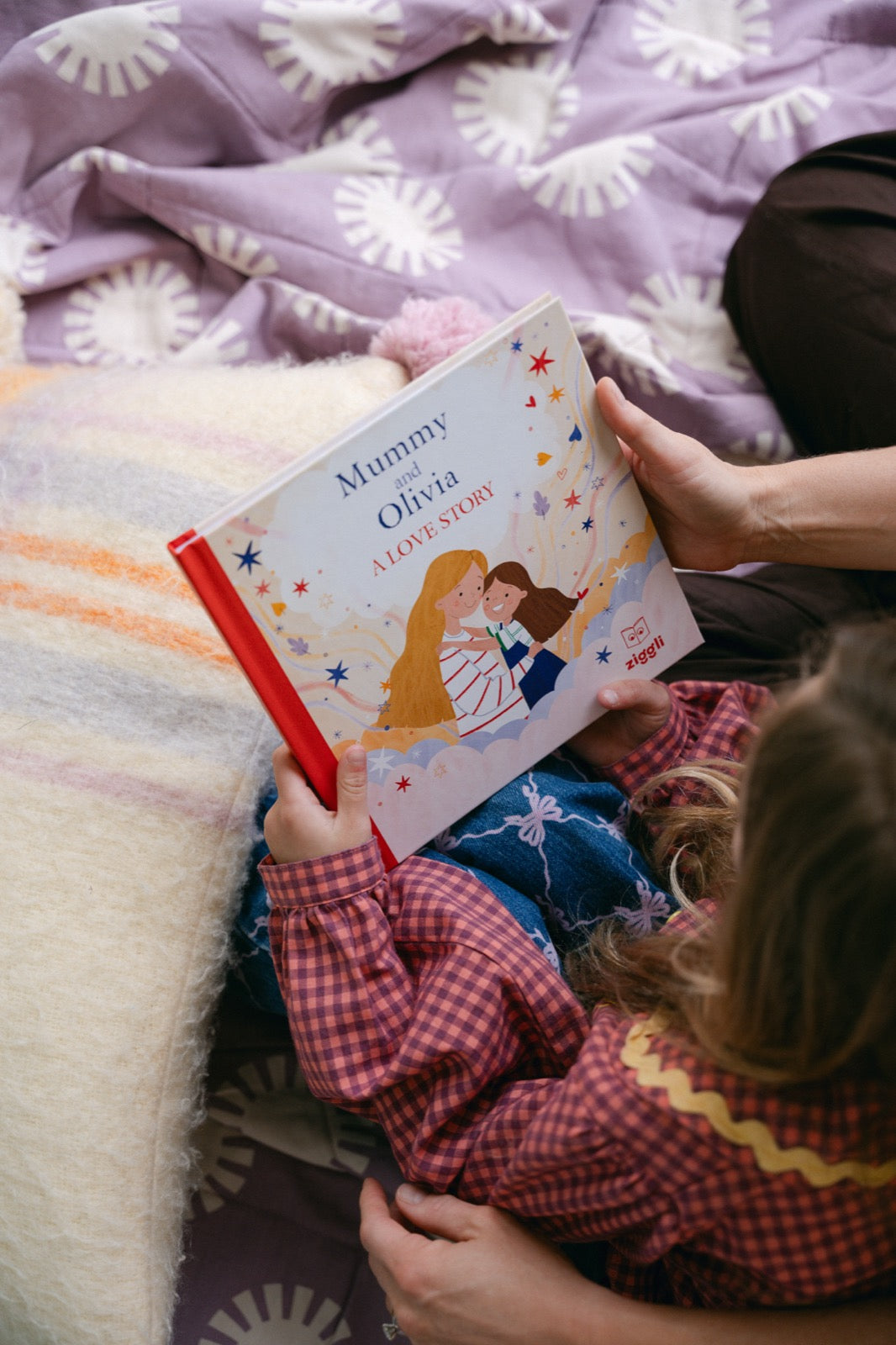 A Love Story personalised book cover held overhead